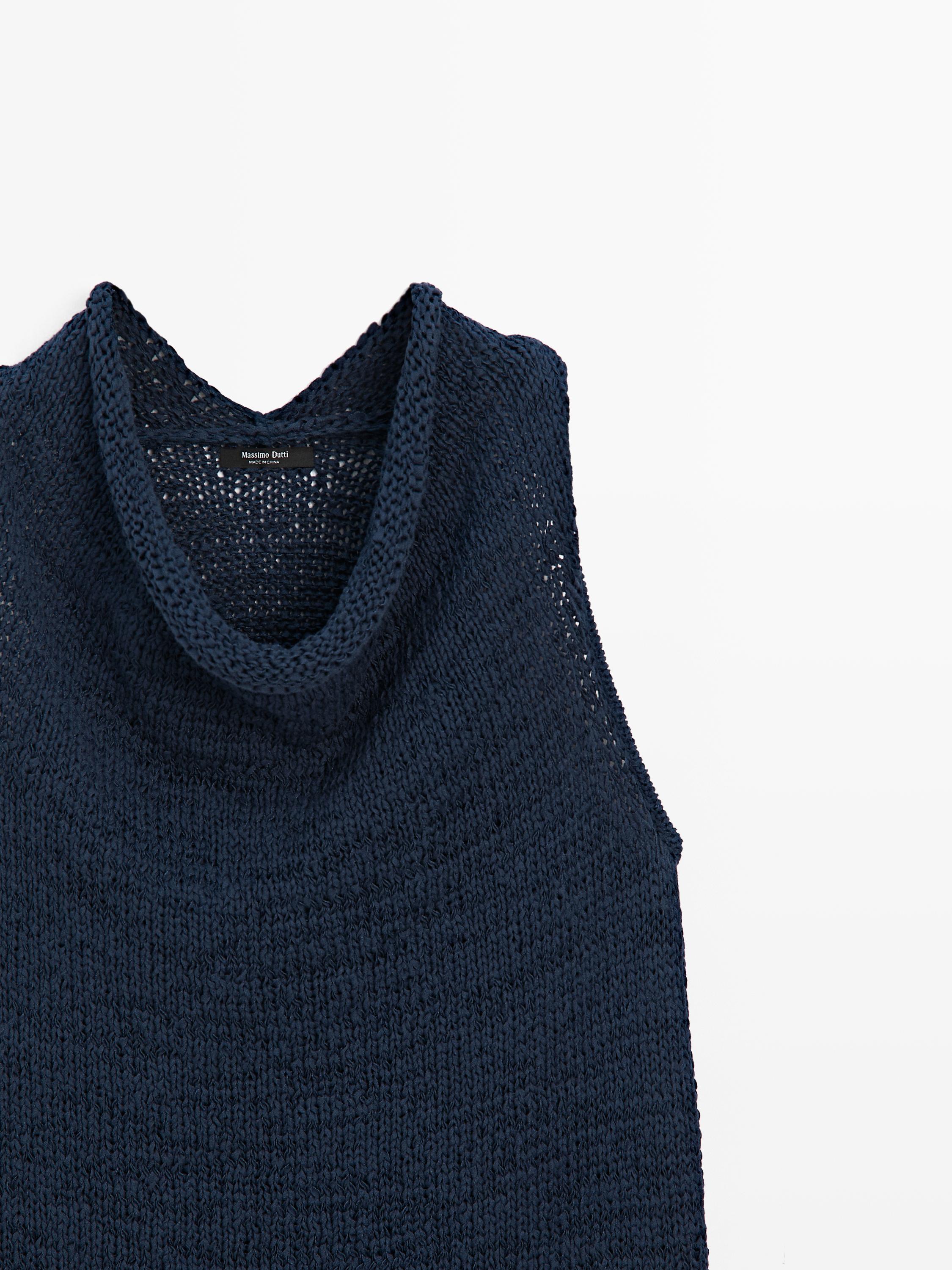 Knit top with draped neckline